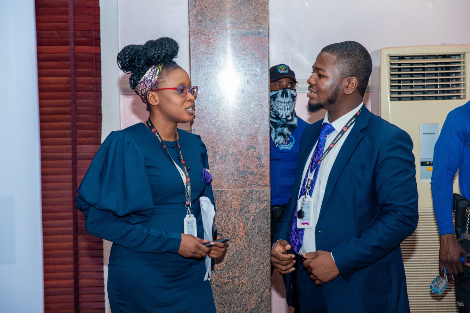 In conversation with a TenTrade partner in the conference hall