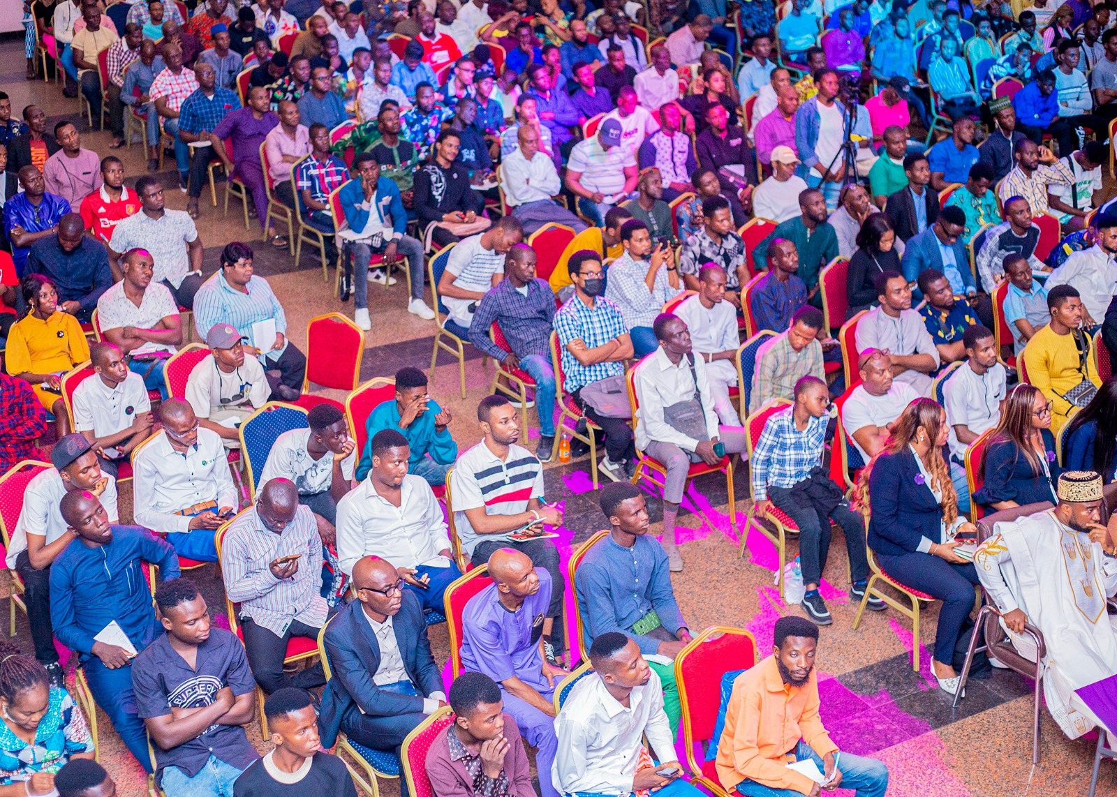 Packed conference hall of attendees at a TenTrade trader event