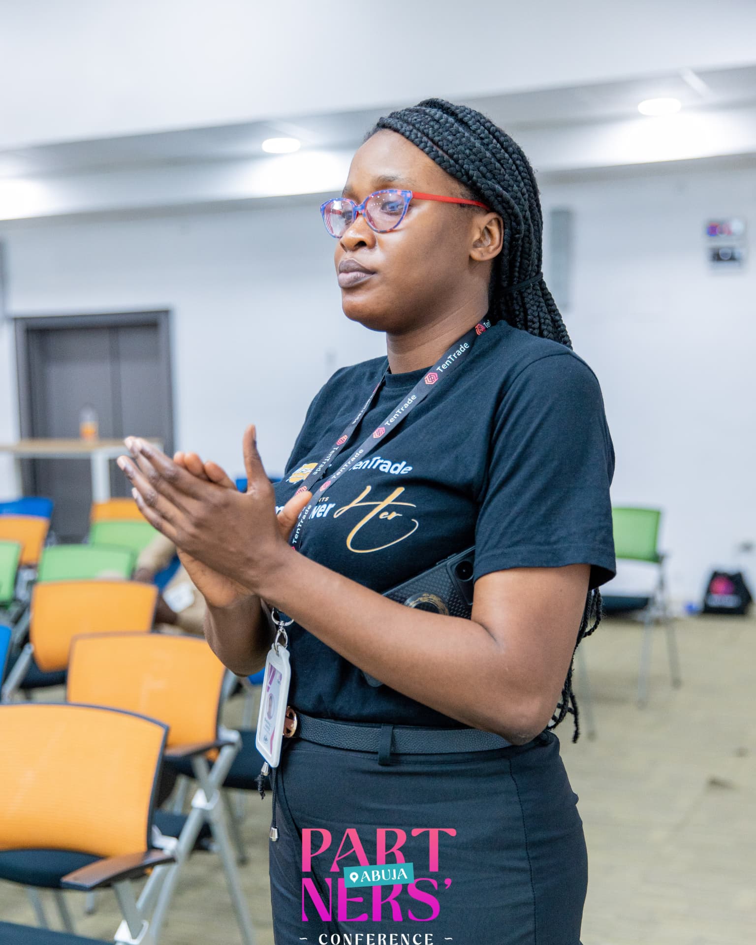 Blessing-Jehova Ubong in an Empower Her t-shirt at the Abuja Partners' Conference