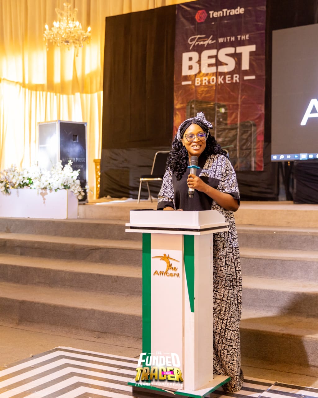 Speaking at the podium at the Kano Funded Trader conference
